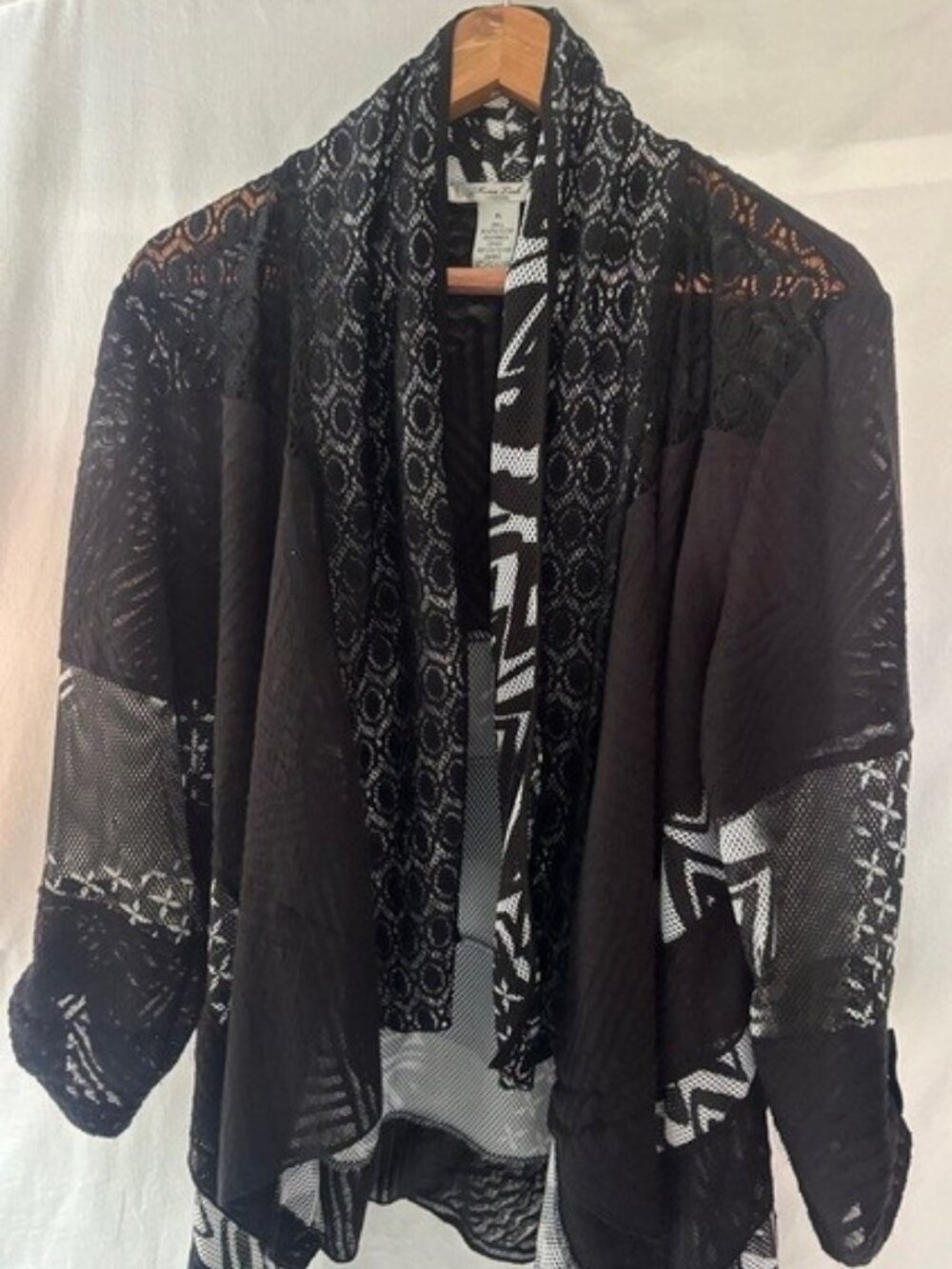 Black open cardigan.  Size XL. Geometric print.